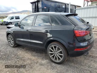 2018 Audi Q3 Premium Plus with VIN WA1JCCFS0JR011688, listed as a Copart auction lot 50661435 with 48,602 mi miles and Clean title. Bid and sale history available at DreamBid. Image 2.