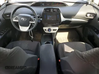 2017 Toyota Prius Two z VIN JTDKBRFU0H3563660, wystawiony jako Copart lot #55823205 z przebiegiem 83 955 mil mil oraz Szkoda całkowita • Salvage title. Historia ofert i sprzedaży dostępna na DreamBid. Obrazek 8.
