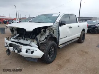 2019 Nissan Titan SV with VIN 1N6AA1E59KN530160, listed as a IAAI auction lot 41557126 with 128,594 mi miles. Bid and sale history available at carsss.com. Image 18.