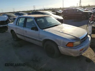 1991 Dodge Spirit z VIN 1B3XA5639MF549470, wystawiony jako Copart lot #76051284 z przebiegiem 62 309 mil mil oraz Szkody całkowita. Historia ofert i sprzedaży dostępna na DreamBid. Obrazek 4.