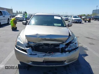 2003 Honda Accord LX z VIN JHMCM56363C033148, wystawiony jako IAAI lot #42261935 z przebiegiem 182 033 mil mil oraz . Historia ofert i sprzedaży dostępna na DreamBid. Obrazek 13.