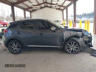 2017 Mazda CX-3 Grand Touring z VIN JM1DKFD70H0150496, wystawiony jako IAAI lot #41746038 z przebiegiem 108 091 mil mil oraz . Historia ofert i sprzedaży dostępna na DreamBid. Obrazek 14.