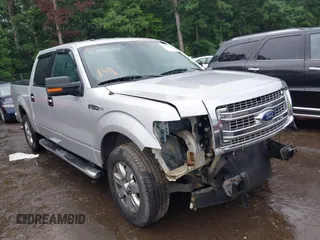 2013 Ford F-150 XL with VIN 1FTFW1CF5DKF63831, listed as a IAAI auction lot 39559854 with 125,721 mi miles and . Bid and sale history available at carsss.com. Image 1.