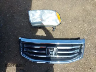 2012 Honda Pilot Touring with VIN 5FNYF4H9XCB083406, listed as a IAAI auction lot 42107651 with 217,678 mi miles. Bid and sale history available at carsss.com. Image 12.