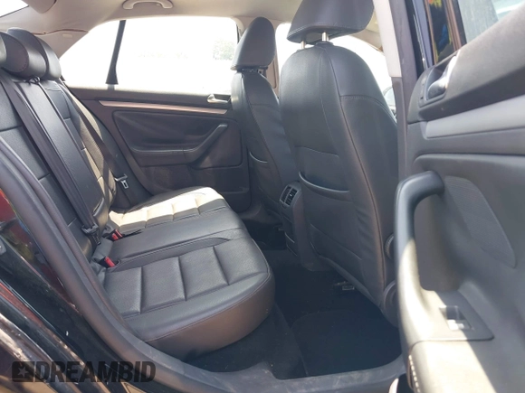 2009 Volkswagen Jetta SE with VIN 3VWRM71K79M166916, listed as a IAAI auction lot 42400659 with 166,061 mi miles and . Bid and sale history available at DreamBid. Image 8.