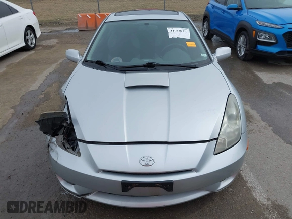 2005 Toyota Celica GT with VIN JTDDR32T950185575, listed as a IAAI auction lot 41710111 with 100,971 mi miles. Bid and sale history available at carsss.com. Image 12.