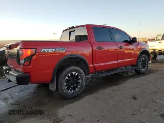 2021 Nissan Titan Pro-4X z VIN 1N6AA1ED0MN512723, wystawiony jako Copart lot #83922304 z przebiegiem 41 649 mil mil oraz Szkoda całkowita • Salvage title. Historia ofert i sprzedaży dostępna na DreamBid. Obrazek 3.