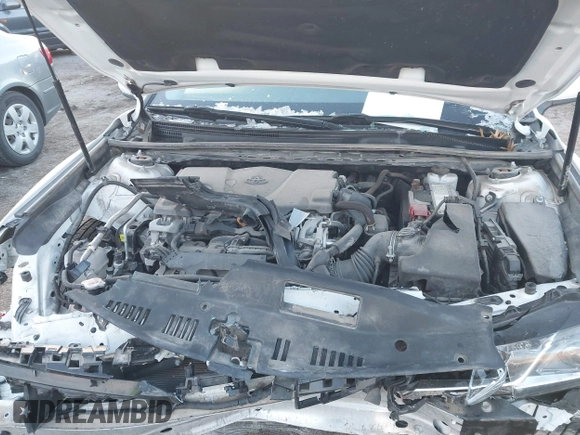 2019 Toyota Camry LE z VIN 4T1B11HK1KU804266, wystawiony jako IAAI lot #41226403 z przebiegiem 91 163 mil mil oraz . Historia ofert i sprzedaży dostępna na DreamBid. Obrazek 10.