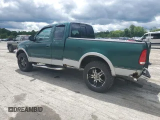 1999 Ford F-150 with VIN 1FTRX18W8XNB82710, listed as a Copart auction lot 58264745 with Not provided miles and Salvage title. Bid and sale history available at DreamBid. Image 2.