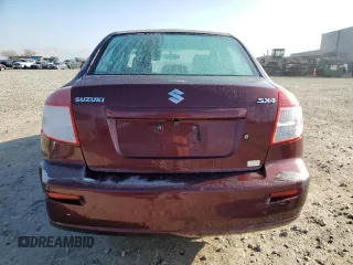 2009 Suzuki SX4 Man FWD with VIN JS2YC412696201399, listed as a Copart auction lot 87543165 with 150,739 mi miles and Salvage Title. Bid and sale history available at carsss.com. Image 6.