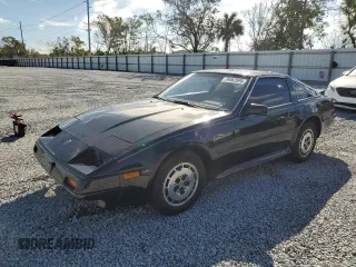 1986 Nissan 300ZX z VIN JN1HZ14S2GX157169, wystawiony jako Copart lot #79462694 z przebiegiem 150 078 mil mil oraz Nie do naprawy • Non repairable. Historia ofert i sprzedaży dostępna na DreamBid. Obrazek 1.