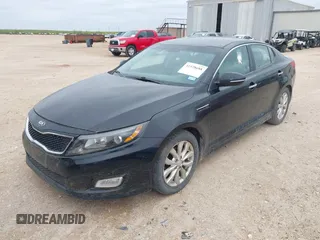 2015 Kia Optima LX with VIN 5XXGM4A71FG399420, listed as a IAAI auction lot 41928688 with 163,440 mi miles. Bid and sale history available at carsss.com. Image 2.