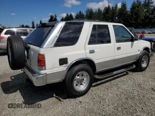 1995 Isuzu Rodeo с VIN 4S2CM58VXS4374193, выставлен на аукционе Copart как лот 54189275 с пробегом 164 756 миль миль и Списание • Salvage title. История ставок и продаж доступна на DreamBid. Изображение 3.