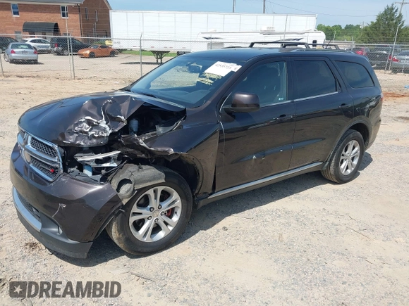 2013 Dodge Durango SXT with VIN 1C4RDJAG7DC580249, listed as a IAAI auction lot 42535723 with 199,626 mi miles and . Bid and sale history available at DreamBid. Image 2.