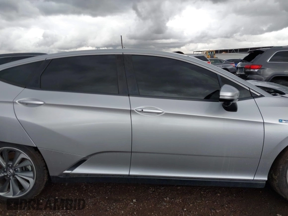 2019 Honda Clarity z VIN JHMZC5F17KC000007, wystawiony jako IAAI lot #41722099 z przebiegiem Nie podano mil oraz . Historia ofert i sprzedaży dostępna na DreamBid. Obrazek 12.