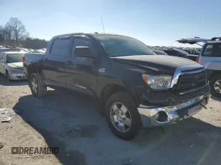 2012 Toyota Tundra 4WD Truck with VIN 5TFDY5F10CX221679, listed as a Copart auction lot 86716234 with 209,394 mi miles and Clean Title. Bid and sale history available at carsss.com. Image 4.
