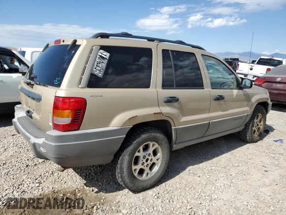 2000 Jeep Grand Cherokee Laredo with VIN 1J4GW48S6YC304447, listed as a Copart auction lot 58001035 with Not provided miles and Clean title. Bid and sale history available at DreamBid. Image 3.