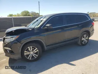 2017 Honda Pilot EX-L with VIN 5FNYF5H55HB046869, listed as a Copart auction lot 48320945 with 124,752 mi miles and Salvage Title. Bid and sale history available at carsss.com. Image 1.