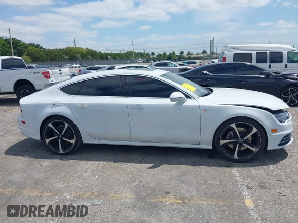 2016 Audi A7 3.0 Prestige with VIN WAU2GAFCXGN102993, listed as a IAAI auction lot 42099259 with 64,490 mi miles. Bid and sale history available at carsss.com. Image 13.