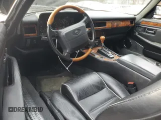 1996 Jaguar XJS with VIN SAJNX2740TC225643, listed as a Copart auction lot 80975784 with 98,427 mi miles and Salvage Title. Bid and sale history available at carsss.com. Image 8.