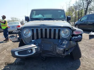 2022 Jeep Wrangler Unlimited Sahara with VIN 1C4HJXEM7NW206585, listed as a IAAI auction lot 42102516 with 10,769 mi miles and . Bid and sale history available at DreamBid. Image 13.