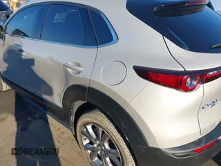 2024 Mazda CX-30 S Premium with VIN 3MVDMBDM9RM628162, listed as a IAAI auction lot 41262359 with 30,392 mi miles and . Bid and sale history available at DreamBid. Image 20.