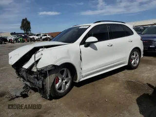 2014 Porsche Cayenne GTS with VIN WP1AD2A24ELA72313, listed as a Copart auction lot 51262095 with 71,905 mi miles and Salvage title. Bid and sale history available at DreamBid. Image 1.