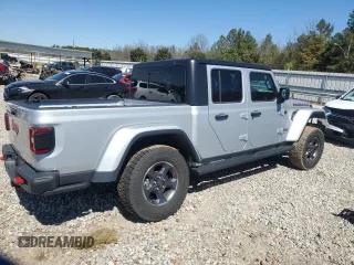 2023 Jeep Gladiator Rubicon with VIN 1C6JJTBG6PL579895, listed as a Copart auction lot 49588395 with 22,066 mi miles and Salvage title. Bid and sale history available at DreamBid. Image 3.