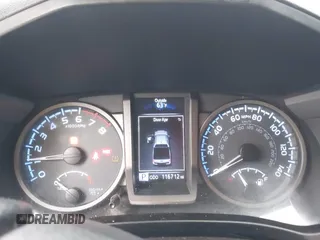 2016 Toyota Tacoma SR5 z VIN 3TMAZ5CN1GM014351, wystawiony jako IAAI lot #42357717 z przebiegiem 116 712 mil mil oraz . Historia ofert i sprzedaży dostępna na DreamBid. Obrazek 7.