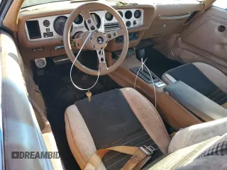 1979 Pontiac Firebird z VIN 2U87K9N120105, wystawiony jako Copart lot #46001565 z przebiegiem 87 739 mil mil oraz Czysty tytuł • Clean title. Historia ofert i sprzedaży dostępna na DreamBid. Obrazek 8.