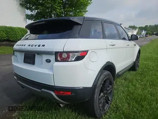 2014 Land Rover Range Rover Evoque Pure Premium z VIN SALVR2BG8EH863485, wystawiony jako Copart lot #57249785 z przebiegiem 133 937 mil mil oraz Tytuł czysty. Historia ofert i sprzedaży dostępna na DreamBid. Obrazek 4.