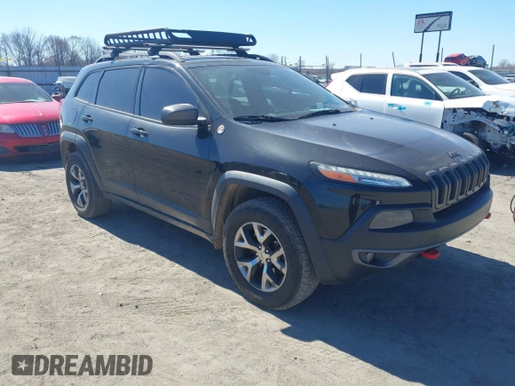 2015 Jeep Cherokee Trailhawk with VIN 1C4PJMBS5FW577470, listed as a IAAI auction lot 41565837 with 191,105 mi miles. Bid and sale history available at carsss.com. Image 1.