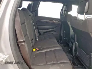 2021 Jeep Grand Cherokee Laredo X z VIN 1C4RJEAG2MC681229, wystawiony jako Copart lot #57771765 z przebiegiem 110 671 mil mil oraz Szkoda całkowita • Salvage title. Historia ofert i sprzedaży dostępna na DreamBid. Obrazek 10.