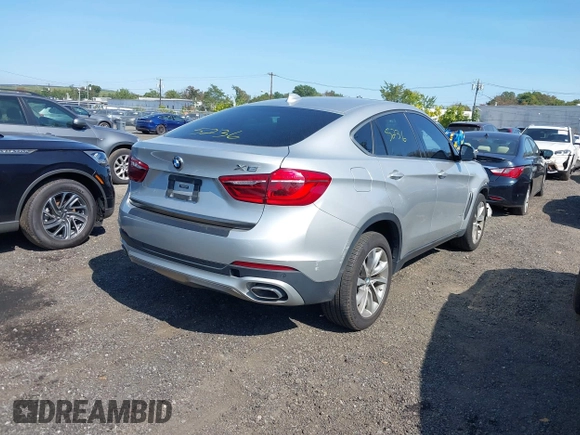 2018 BMW X6 xDrive35i z VIN 5UXKU2C51J0X50507, wystawiony jako IAAI lot #40275236 z przebiegiem 67 523 mil mil oraz . Historia ofert i sprzedaży dostępna na DreamBid. Obrazek 4.