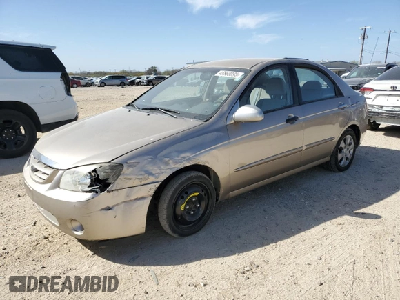 2006 Kia Spectra EX with VIN KNAFE121565364950, listed as a Copart auction lot 48860895 with 209,615 mi miles and Salvage Title. Bid and sale history available at DreamBid. Image 1.
