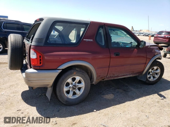 2002 Isuzu Rodeo z VIN 4S2CK57W324328446, wystawiony jako Copart lot #58097174 z przebiegiem 118 514 mil mil oraz Szkoda całkowita • Salvage title. Historia ofert i sprzedaży dostępna na DreamBid. Obrazek 3.