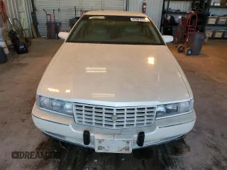 1993 Cadillac Seville Touring STS z VIN 1G6KY5295PU817593, wystawiony jako Copart lot #47807075 z przebiegiem Nie podano mil oraz Czysty tytuł • Clean title. Historia ofert i sprzedaży dostępna na DreamBid. Obrazek 5.