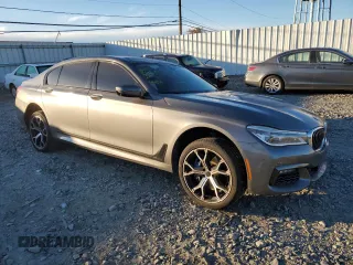 2017 BMW 7 Series with VIN WBA7F2C32HG422866, listed as a Copart auction lot 76177184 with 146,565 mi miles and Salvage Title. Bid and sale history available at DreamBid. Image 4.