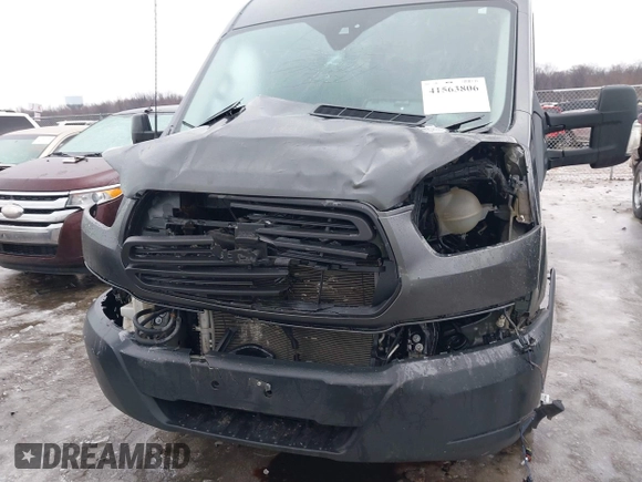 2016 Ford Transit Cargo z VIN 1FTYR2CG8GKB14176, wystawiony jako IAAI lot #41563806 z przebiegiem 93 177 mil mil oraz . Historia ofert i sprzedaży dostępna na DreamBid. Obrazek 6.