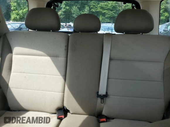 2007 Ford Escape XLS with VIN 1FMYU02Z27KB99534, listed as a Copart auction lot 66872184 with 107,072 mi miles and Salvage Title. Bid and sale history available at carsss.com. Image 10.