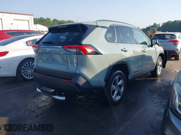 2021 Toyota RAV4 Hybrid LE with VIN JTMB6RFV3MD038562, listed as a IAAI auction lot 42576852 with 27,463 mi miles and . Bid and sale history available at DreamBid. Image 4.