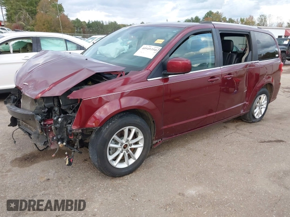 2019 Dodge Grand Caravan SXT with VIN 2C4RDGCGXKR585563, listed as a IAAI auction lot 40949350 with 122,577 mi miles and . Bid and sale history available at DreamBid. Image 18.