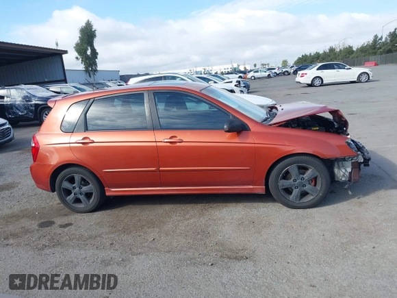 2007 Kia Spectra with VIN KNAFE161275003137, listed as a IAAI auction lot 41697530 with 256,834 mi miles. Bid and sale history available at carsss.com. Image 14.