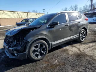 2017 Honda CR-V Touring with VIN 2HKRW2H95HH630048, listed as a Copart auction lot 46582815 with 0 mi miles and Salvage Title. Bid and sale history available at carsss.com. Image 1.