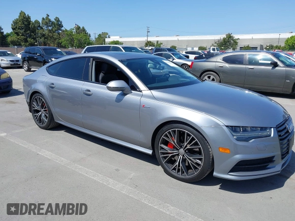 2016 Audi A7 Prestige z VIN WAU2GAFC3GN002153, wystawiony jako IAAI lot #42292870 z przebiegiem 161 013 mil mil oraz . Historia ofert i sprzedaży dostępna na DreamBid. Obrazek 1.