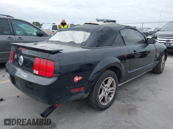 2009 Ford Mustang with VIN 1ZVHT84N995137661, listed as a IAAI auction lot 41380685 with 185,620 mi miles and . Bid and sale history available at DreamBid. Image 4.