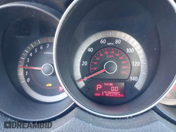 2010 Kia Forte EX with VIN KNAFU4A26A5306448, listed as a IAAI auction lot 42048677 with 172,095 mi miles. Bid and sale history available at carsss.com. Image 7.