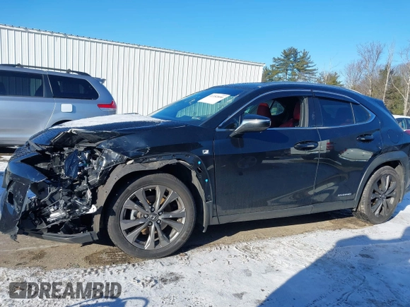 2021 Lexus UX with VIN JTHR9JBH8M2037134, listed as a IAAI auction lot 41352890 with 56,198 mi miles. Bid and sale history available at carsss.com. Image 15.