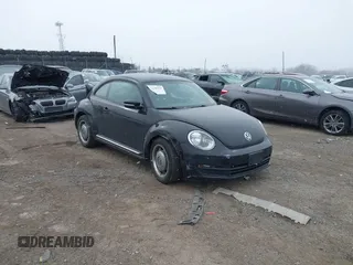 2012 Volkswagen Beetle 2.5L PZEV with VIN 3VWJP7AT0CM628169, listed as a IAAI auction lot 41628754 with 64,770 mi miles. Bid and sale history available at carsss.com. Image 1.
