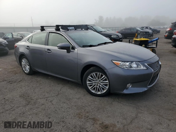 2015 Lexus ES 330 with VIN JTHBK1GGXF2154853, listed as a Copart auction lot 64828665 with 75,119 mi miles and Salvage title. Bid and sale history available at DreamBid. Image 4.